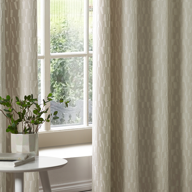 Manhattan Ivory Eyelet Curtains over curtains close up image