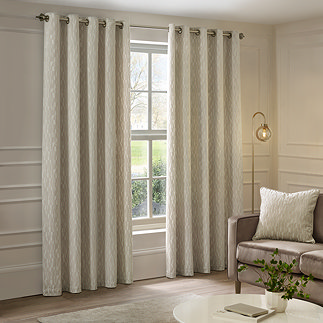 Manhattan Ivory Eyelet Curtains over curtains image