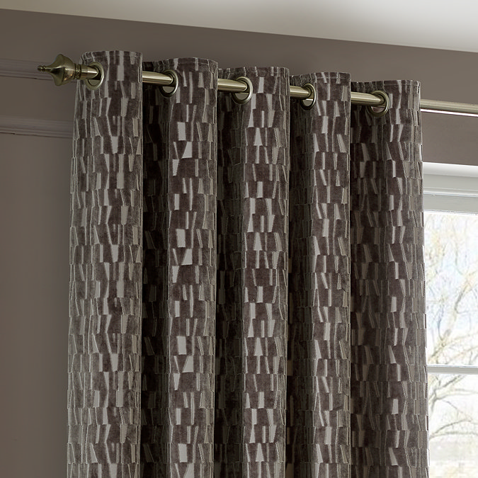Manhattan Mink Eyelet Curtains over a window close up image