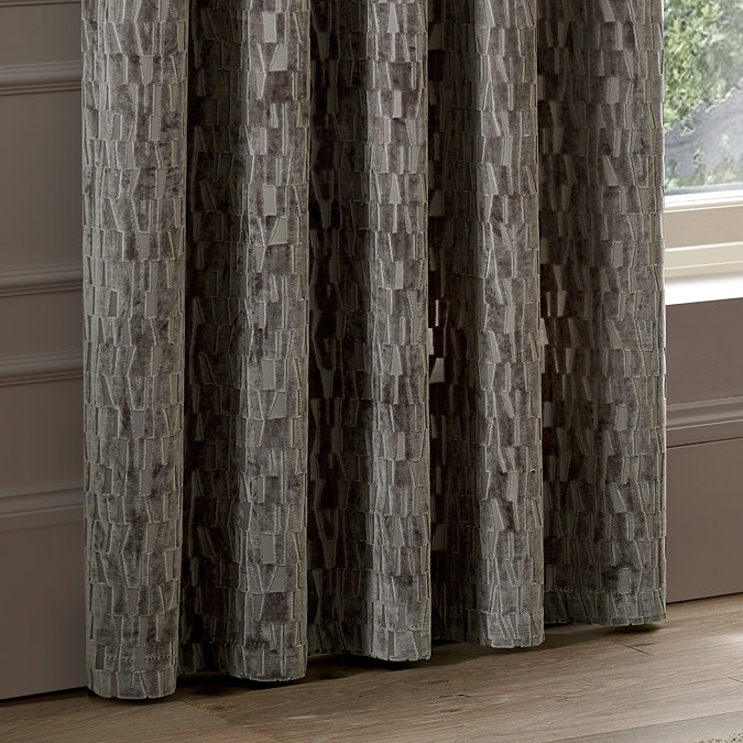Manhattan Mink Eyelet Curtains over a window close up image