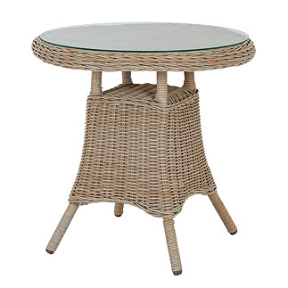 image cut out on white background of wicker-effect bistro table with tempered glass top