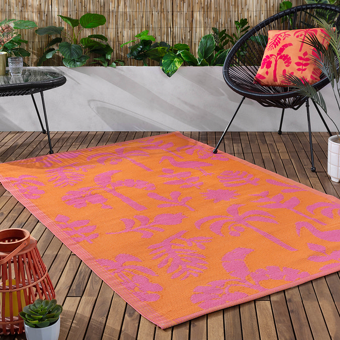 Marula outdoor rug in pink and orange on floor image 2