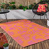 Marula outdoor rug in pink and orange on floor image 2