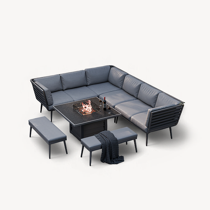 cut out image of grey corner lounge set and benches around a fire pit table