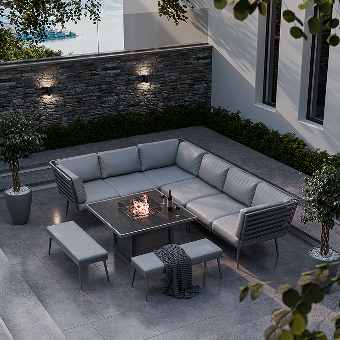 image of outdoor sectional grey sofa positioned around a fire pit table