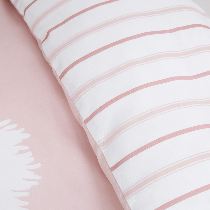 Meadowsweet floral in blush pink duvet cover set on bed close up image 3