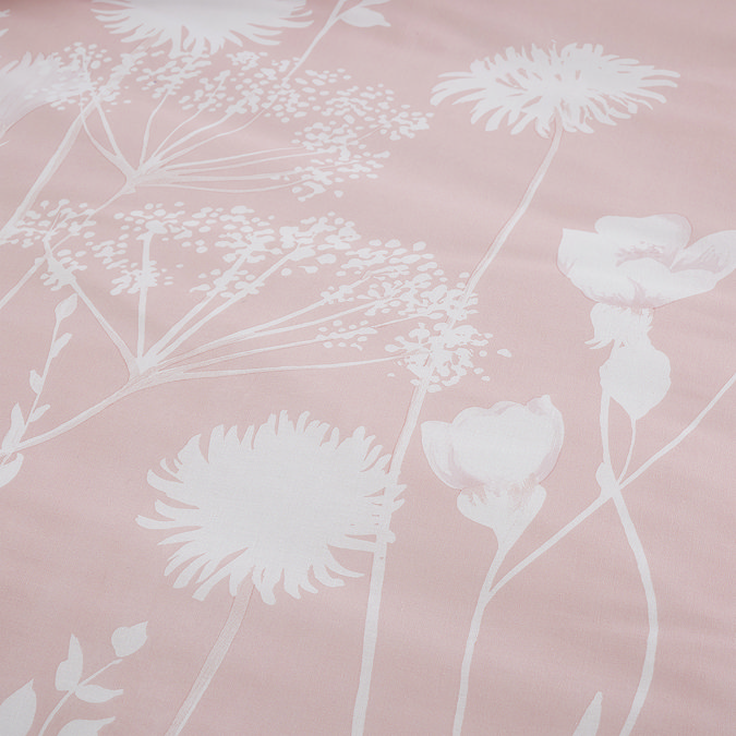 Meadowsweet floral in blush pink duvet cover set on bed close up image 4