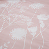 Meadowsweet floral in blush pink duvet cover set on bed close up image 4