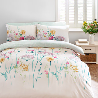 Meadowsweet Floral Bright Duvet cover set on bed image 1