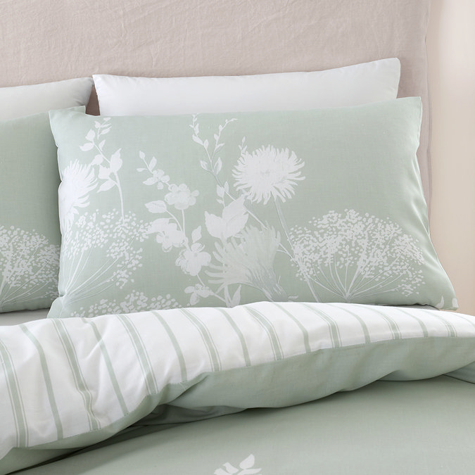 Meadowsweet floral sage green duvet cover set on bed image 1
