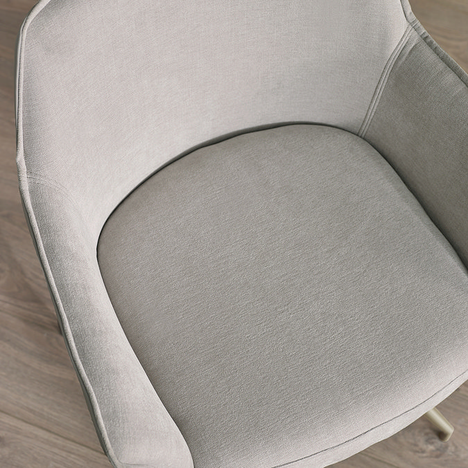 close up on seat of light grey chenille chair