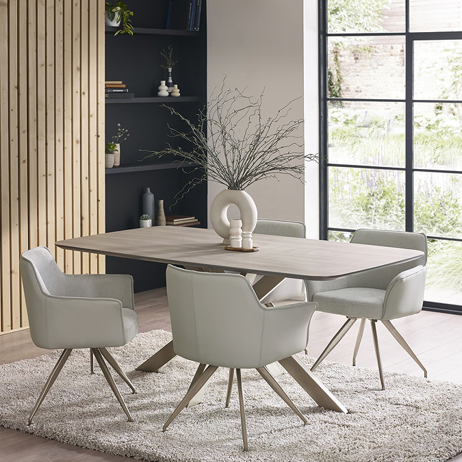image of light grey chenille dining chairs around a table