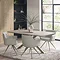 image of light grey chenille dining chairs around a table
