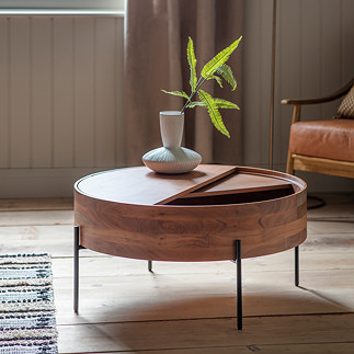 image of round wood storage coffee table, with half its top moveable to reveal drawer to put things in, pant on top