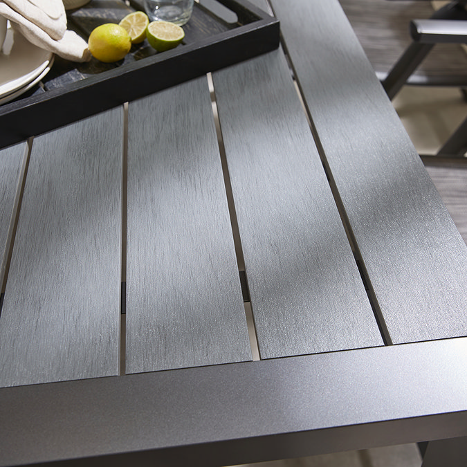 close up image of slatted grey outdoor table
