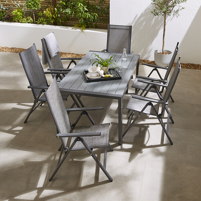image taken from slightly above of sleek grey outdoor six chair dining set