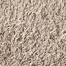 close up on shaggy material of beige rug