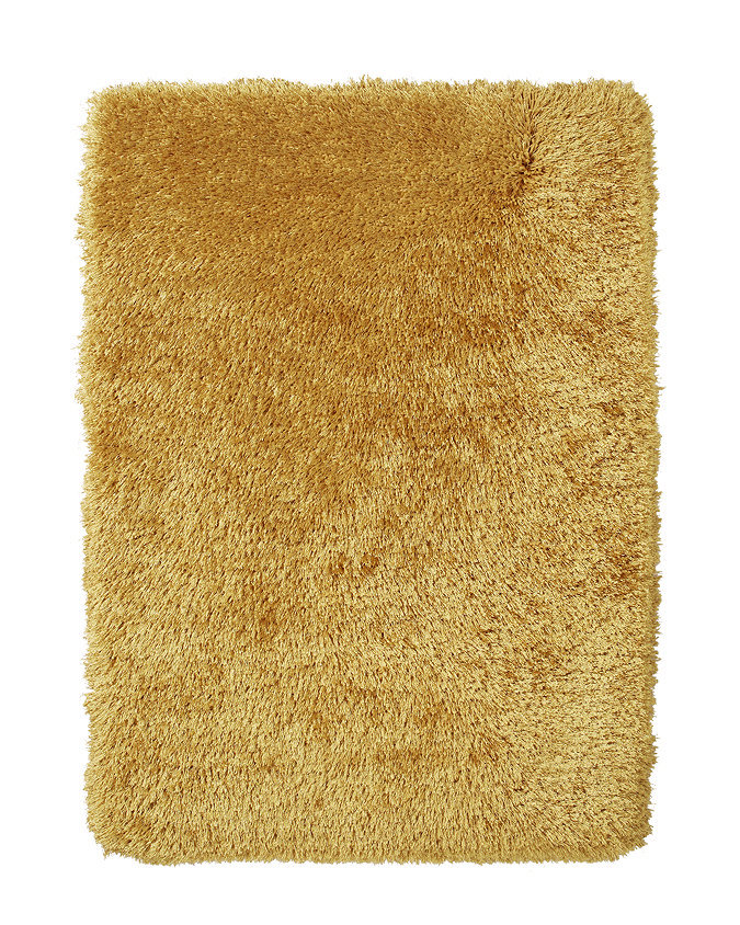 image cut out on white background of yellow shaggy rug
