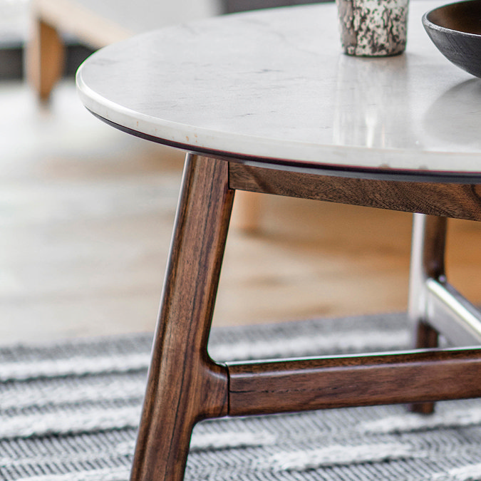 close up on round marble top of round coffee table