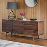 image of two door three drawer sideboard against a wood panelled wall