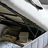 close up image of storage space inside ottoman bed