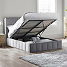 image of grey panelled velvet bed with ottoman storage lifted up to reveal space within
