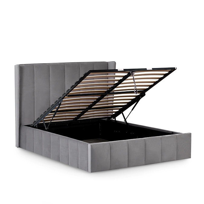 image cut out on white background of ottoman bed with slatted base lifted up to show storage space