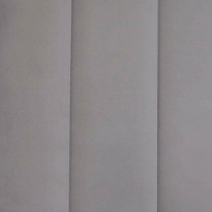 close up image of velvet grey panelled headboard