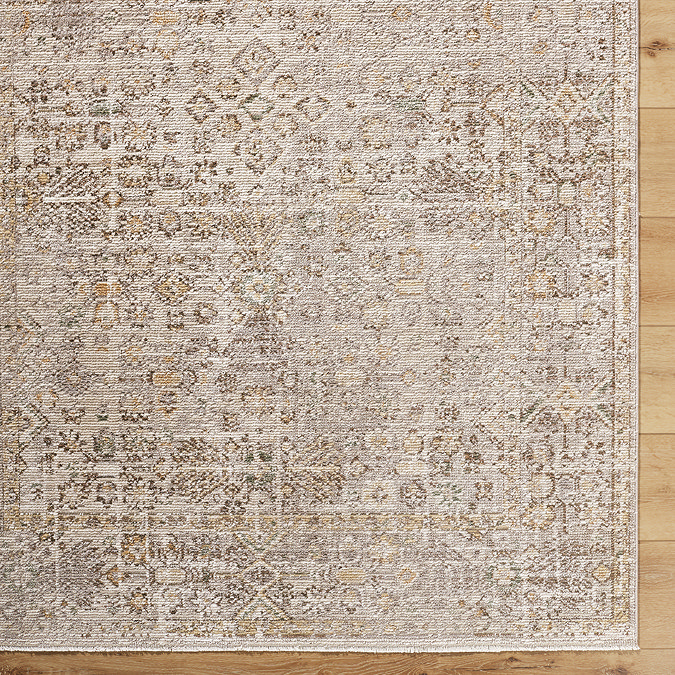 close up image of boho brown and taupe rug