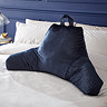 Velvet Cuddle chair cushion in navy on bed image 1