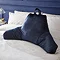 Velvet Cuddle chair cushion in navy on bed image 1