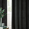 Neptune Charcoal Eyelet Curtains over a window close up image