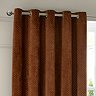 Neptune Eyelet Curtains in Copper over a window close up image