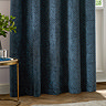 Neptune Eyelet Curtains in Navy over a window close up image