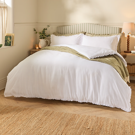 newtilly white on bed image 1