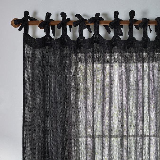 Nimbus Tie Top Sheer Curtain Panel over a window close up image