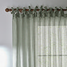 Nimbus Eucalyptus Green Tie Top Sheer Curtain Panel over a window close up image