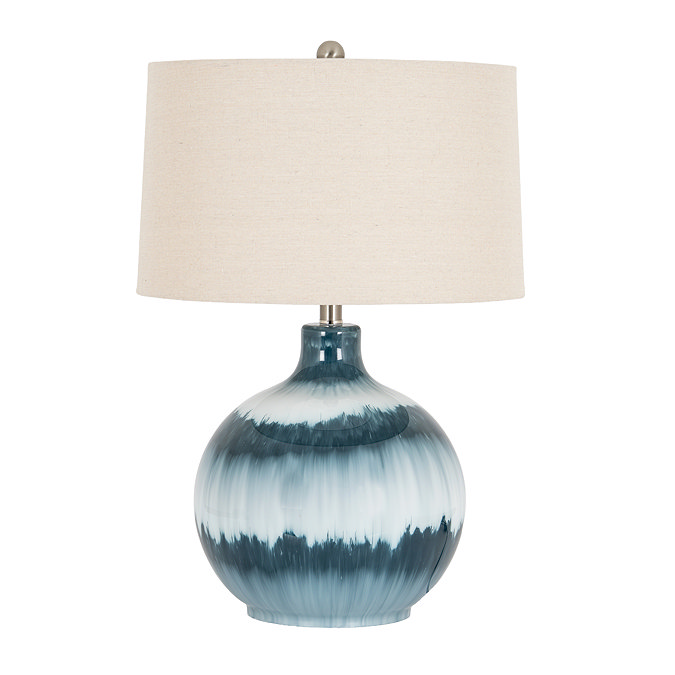 cut out image of ocean shadows lamp with linen shade