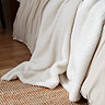Olann Ecru throw image