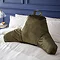 Velvet cuddle cushion olive on bed image 1
