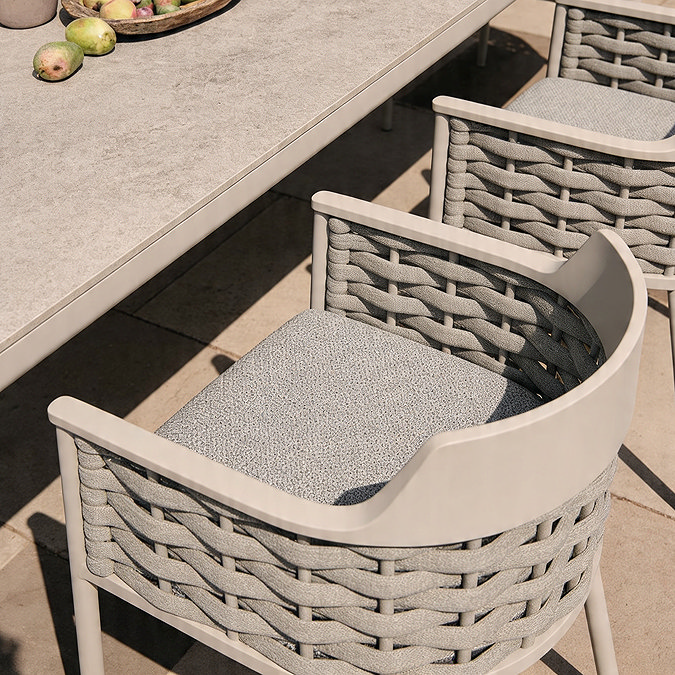 close up zoomed in image of grey rope weave garden chair