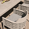 close up zoomed in image of grey rope weave garden chair