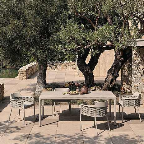 image of grey rope detail six seat dining collection on sandy outdoor area
