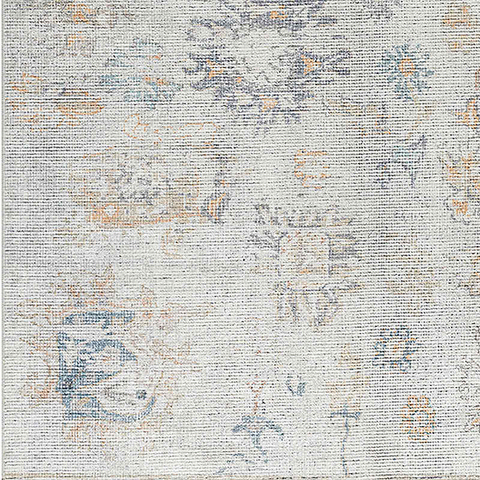 close up image of grey-blue floral vintage rug swatch