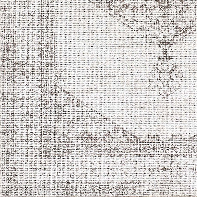 close up swatch image of dark brown and cream vintage boho rug