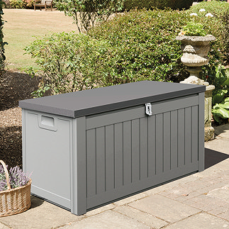 image of grey storage with wood effect front and black lid, on a garden patio