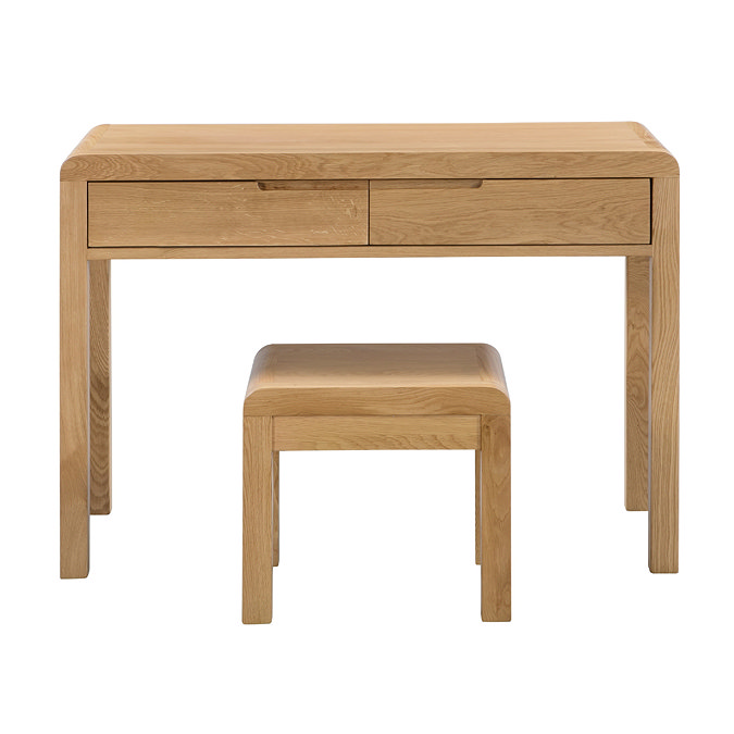 front on image of light wooden desk with curved edges, cut out on white background.