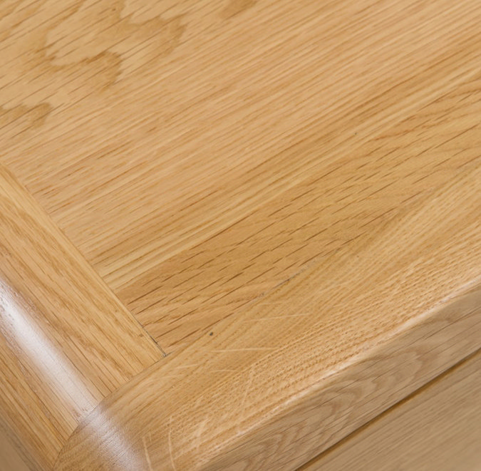 close up on light wood grain of a desk