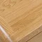 close up on light wood grain of a desk