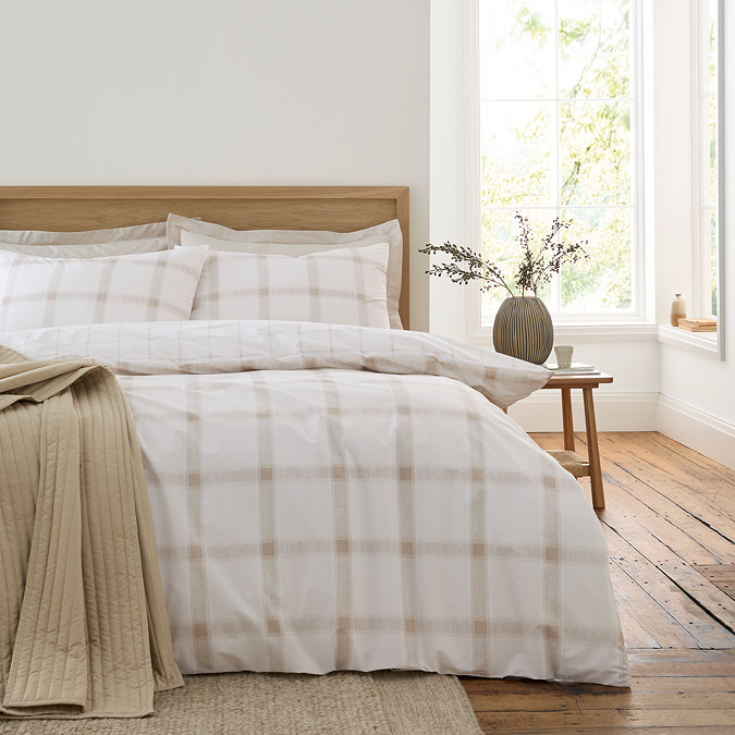 Oxton duvet cover set in natural on bed image 1